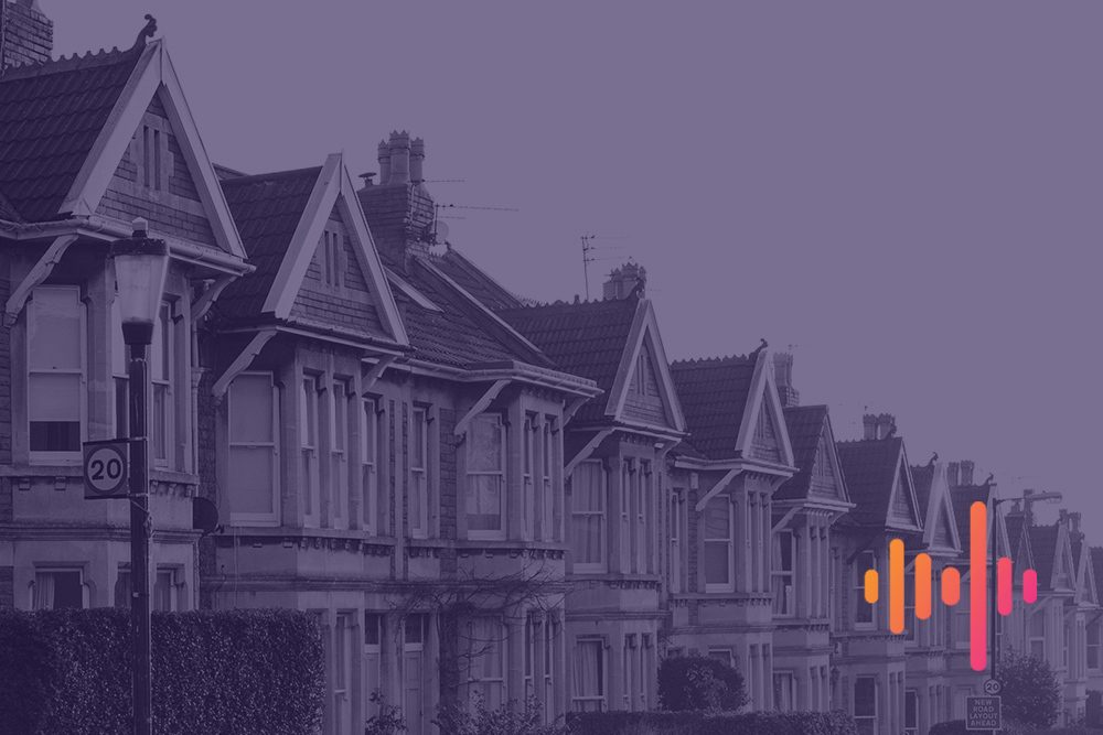 Purple-tinted row of bay-fronted terraced houses along a street, with an orange and pink waveform