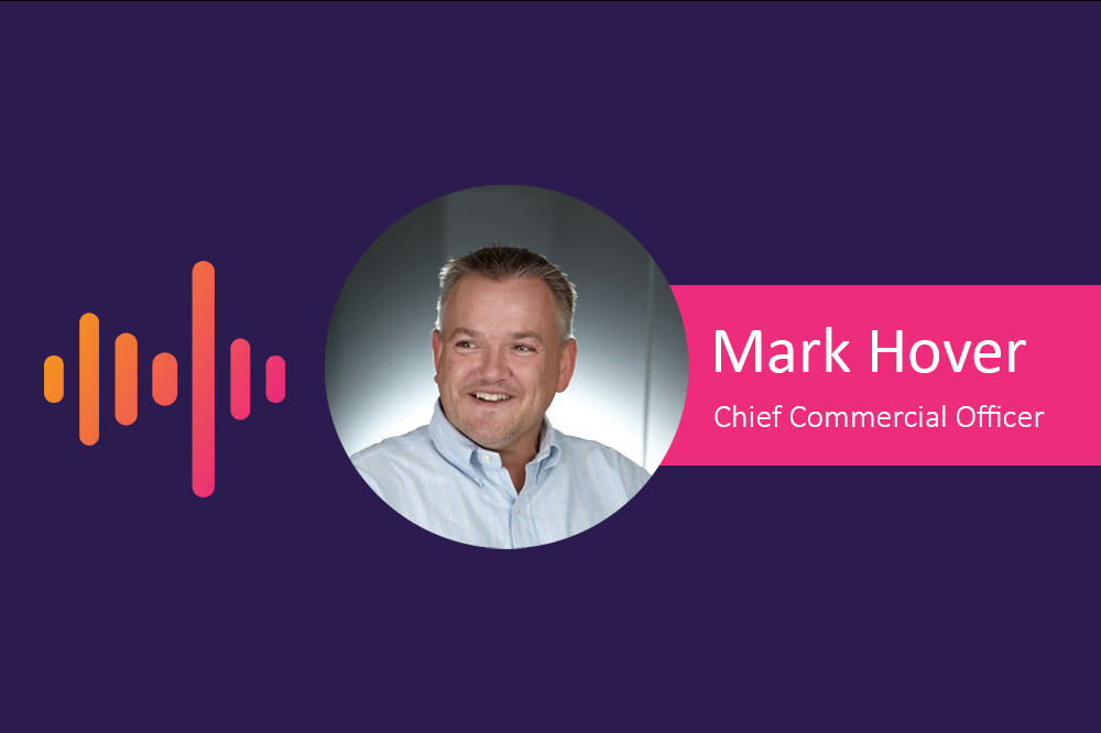 Announcement graphic with a circular photo of Mark Hover, Chief Commercial Officer, beside an orange and pink waveform