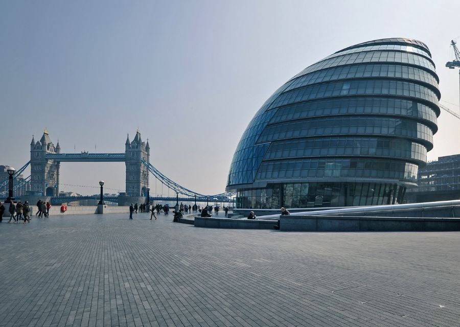 People walking close to City Hall in London.