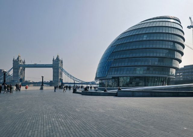 People walking close to City Hall in London.
