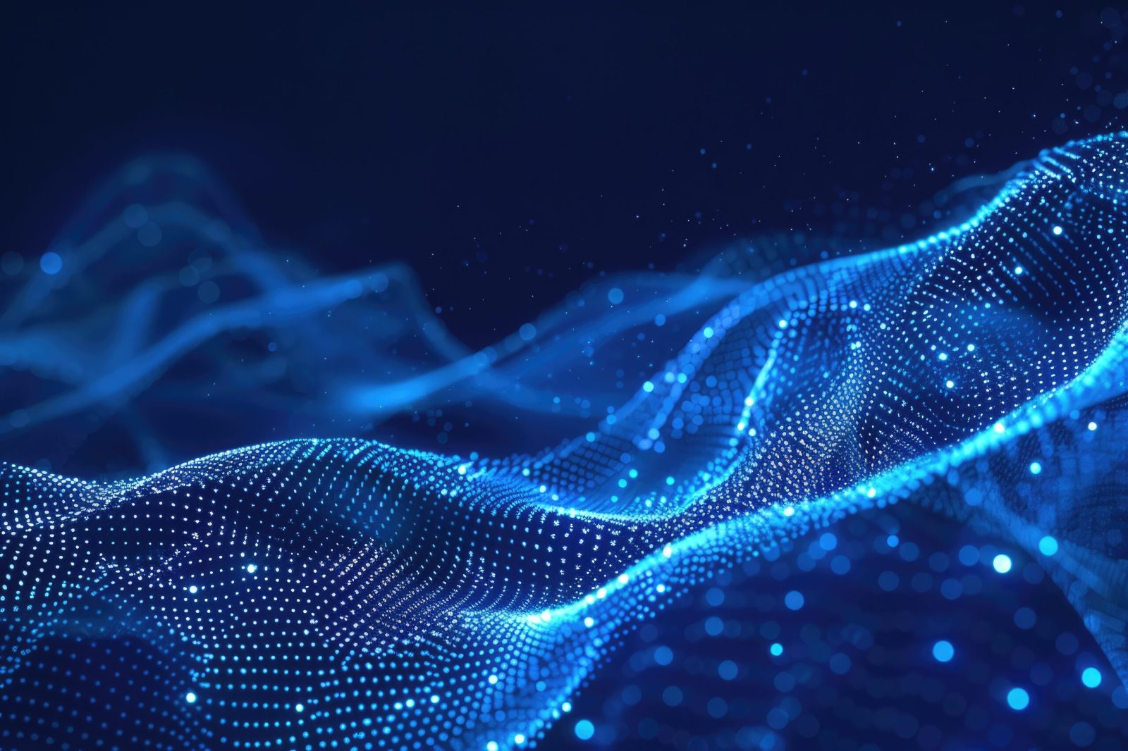Flowing wave of glowing blue digital particles across a dark background