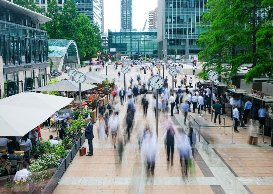 London motion blurred people in business office scene