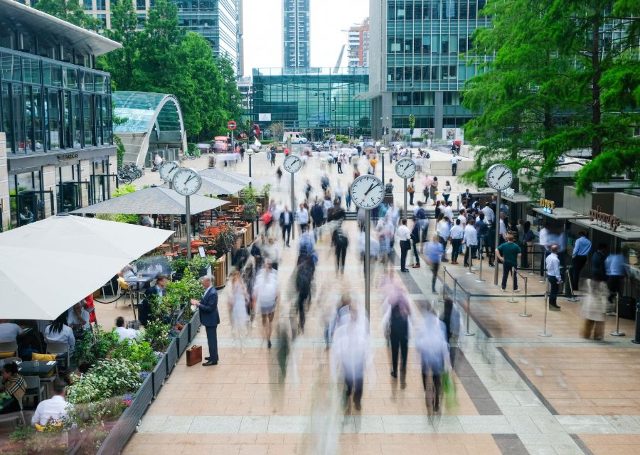 London motion blurred people in business office scene