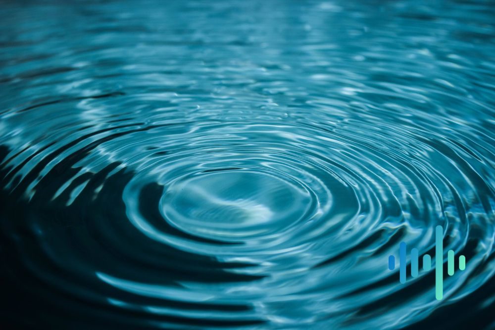 Concentric ripples spreading across dark teal water, with a blue and teal waveform