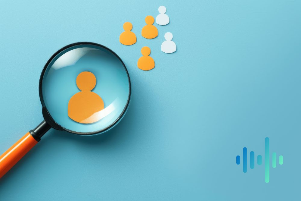 Magnifying glass over an orange person figure beside small orange and white figures on blue, with a waveform