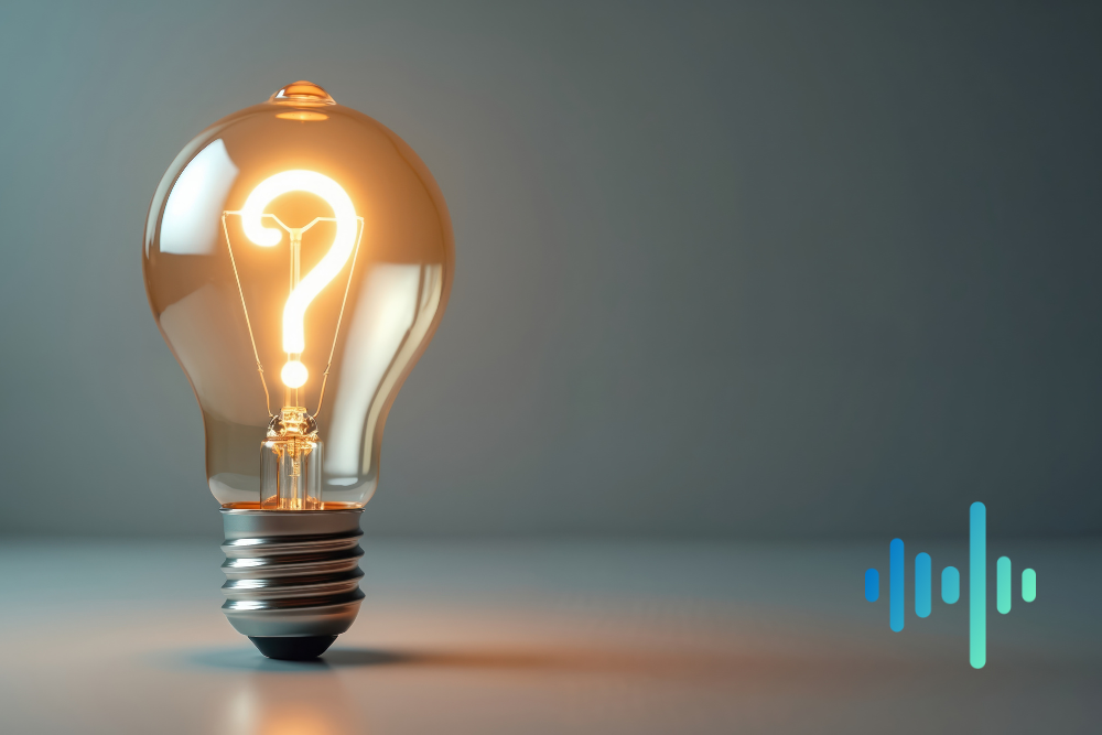 Glowing light bulb with a question-mark filament against a grey background, with a blue and teal waveform