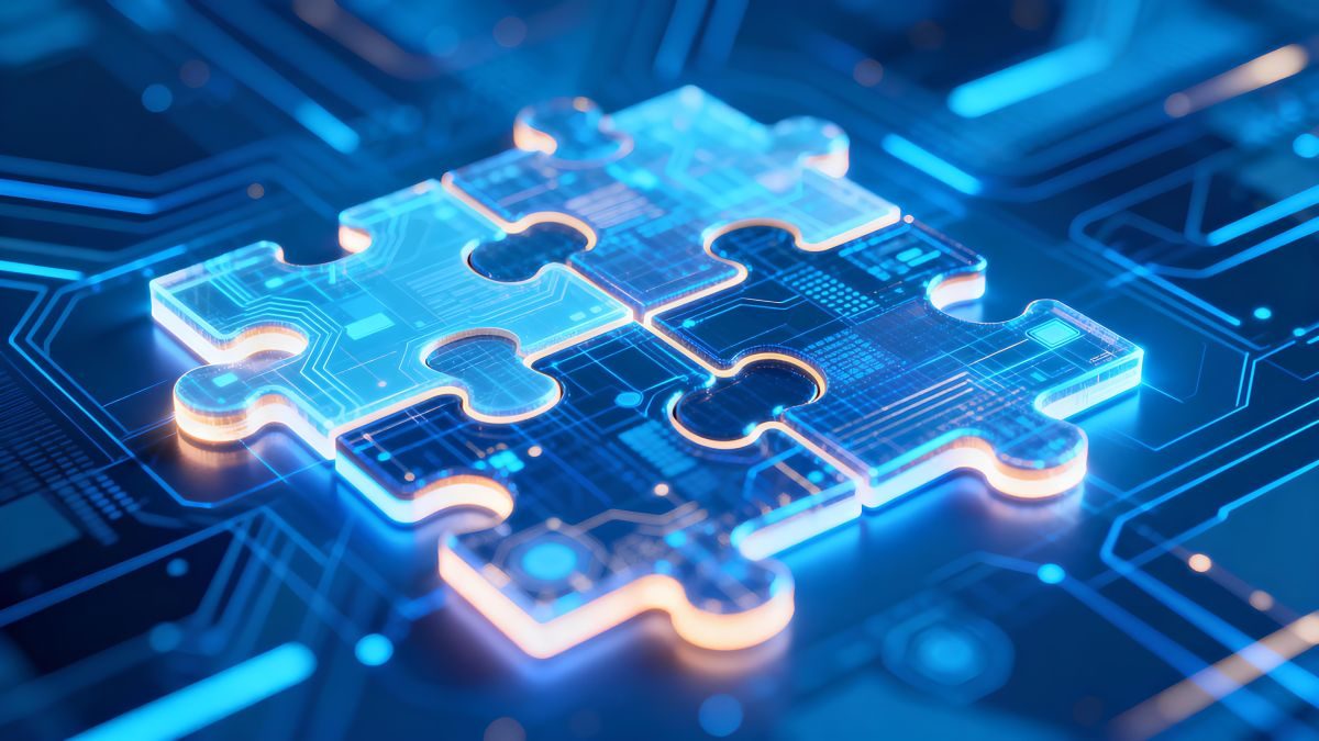 Glowing translucent blue jigsaw pieces fitting together on a circuit board